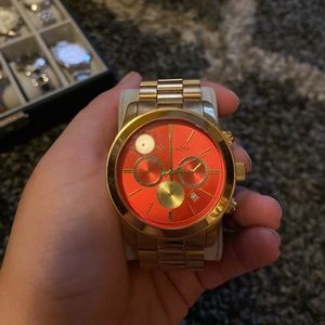 Michael Kors coral and gold watch